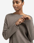 Boat neck sweater with refined decorative seams
