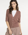Batwing cardigan with short sleeves and button closure