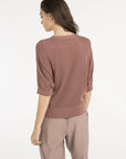 Batwing cardigan with short sleeves and button closure