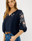 Floral Embroidered Split Neck Blouse