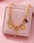 Beige Beaded Bow Heart Rhinestone Charm Necklace