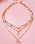 Multi Layered Rhinestone Heart Charm Necklace