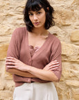 Batwing cardigan with short sleeves and button closure