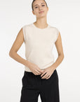Sleeveless knitted top with playful sleeve edge